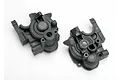 Two black plastic Traxxas gearbox case halves shown from an overhead angle on a white background.