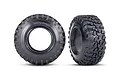 Two Traxxas 2.2 inch Canyon RT crawler tyres shown from front and side angles against a white background.