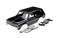 A black Traxxas 1/10 scale Chevrolet Blazer RC body shell with chrome bumpers and black plastic mounting accessories on a white background.