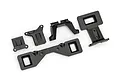 A set of black plastic Traxxas clipless body latch components arranged on a white background.