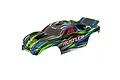 A pre-painted green, blue, and black Traxxas Rustler clipless RC body shell shown from a high-angle perspective against a white background.