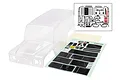 Clear, unpainted Traxxas TRX-4 Land Rover Defender body shell with a decal sheet and a separate inset showing included plastic accessory parts.