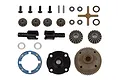 A collection of Team Associated RC differential gear and case parts including metal gears, plastic housing, screws, and washers laid out on a white background.