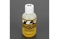 A bottle of TLR 45w silicone shock oil with a white flip-top cap, featuring the Team Losi Racing logo on a yellow and black label.