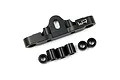 A black aluminium front suspension mount for an RC car with five small black spacers, isolated on a white background.