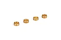 Four small cylindrical brass bushings arranged in a row against a white background.