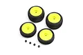 A set of four Losi Micro-B RC buggy wheels and tires with bright yellow rims and four black wheel nuts on a white background.