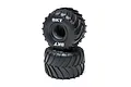 Two black monster truck tires with BKT branding, stacked vertically on a white background.