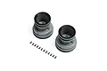 Two light grey Losi Mini LMT monster truck wheels with black beadlock rings and a set of small black screws on a white background.
