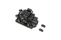 A black plastic TLR rear gearbox case for an 8XT RC vehicle, shown with two small mounting spacers on a white background.