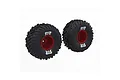 Two ARRMA dBoots Cut Chevron monster truck tires with red rims and black rubber treads on a white background.