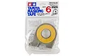 A roll of Tamiya 6mm masking tape in a grey plastic dispenser, sealed in original retail packaging.