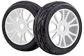 Two black rubber RC on-road tires mounted on white multi-spoke plastic rims against a white background.