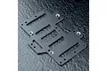 A black FRP battery mounting plate for an RC car, featuring multiple cutouts and countersunk mounting holes, set against a textured dark background.