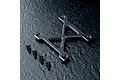 MST black aluminium X-shaped suspension arm mount brace with four matching black screws on a textured dark surface.