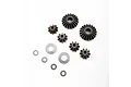 A set of Losi internal differential gears and metal shims arranged on a white background.