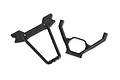 Two black plastic Traxxas rear bumper mount and brace components isolated on a white background.