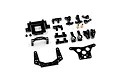 A collection of black anodized aluminium and carbon fiber RC car upgrade parts from Yeah Racing, laid out on a white background.