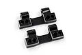 Two black aluminium RC rear lower arm mounts from Yeah Racing, shown from an angled perspective on a white background.