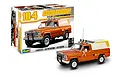 Revell 1/24 scale 1979 Jeep J-10 Pickup with Camper model kit, showing the assembled orange truck model next to its illustrated product box.