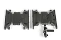 Two black plastic Axial SCX10 II skid plates on a white background, one with a small attached sprue piece.