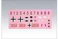 A sheet of waterslide decals for a Heng Long RC tank featuring numbers, German crosses, and various military-style insignias on a pink backing paper.