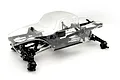 Reefs RC XP10 Plague Black Edition 1/10 scale rock crawler chassis kit with a clear unpainted body shell against a white background.