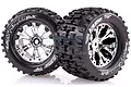 Two Louise 2.8 inch MT-Pioneer RC monster truck tyres mounted on chrome-finished multi-spoke wheels, shown against a white background.