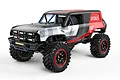Studio product photo of the MJX RC Hyper Go Ford Bronco R Baja1000 1/12 scale RC rock crawler featuring a black, white, and red livery.