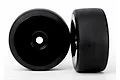 Two black RC car wheels with slick tyres mounted on black dish rims, shown against a white background.