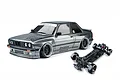MST E30RB grey RC drift car with Pandem body kit and separate black chassis on a white background.