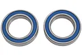 Two circular ball bearings with blue rubber seals, shown against a plain white background.