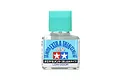 Tamiya Low Odour Extra Thin Cement bottle with a turquoise cap and blue and white label against a white background.