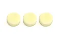 Three round yellowish air cleaner foam sponge elements for RC nitro engines arranged in a row on a white background.