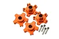 Four orange anodized aluminium wheel hex adapters with metal pins on a clean white background.