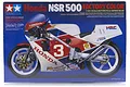 Tamiya 1/12 scale Honda NSR500 Factory Color motorcycle model kit box art showing a red, white, and blue racing bike.