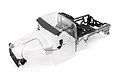 Clear unpainted RGT 1/10 Challenger RC crawler body shell featuring a black sun visor, grille, side mirror, and roll cage.