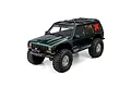 Axial SCX10 III Jeep Cherokee XJ 1/10 scale green RC rock crawler studio shot on white background