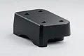 Black plastic MJX RC gearbox cover shown from an angle against a neutral white studio background.