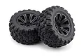 Two black RC truggy wheels and tyres with aggressive tread patterns mounted on multi-spoke rims against a white background.