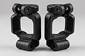 Two black plastic RC car C-hub carriers displayed side by side against a clean light grey studio background.