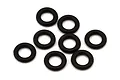 A set of eight small black rubber washers arranged on a clean white background.