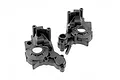 Two black plastic ARRMA gearbox case halves and a small metal pin on a white background.