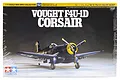 Tamiya 1/72 scale Vought F4U-1D Corsair plastic model kit box art showing a finished dark blue fighter plane model.
