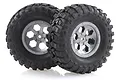 Two 1.9 inch RC crawler wheels with black off-road rubber tyres and grey six-spoke plastic rims.