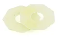 Two pale yellow, octagonal slipper clutch pads for an RC car drivetrain.