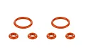 A set of six orange rubber O-rings of varying sizes arranged on a plain white background.