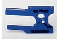 A blue anodized aluminium motor mount for an RC vehicle, featuring a machined design with mounting holes and slots.