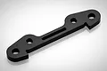 A black anodized aluminium suspension arm pin brace for an RC vehicle, shown from an angled perspective against a white background.