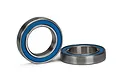 Two Traxxas 15x24x5mm rubber shielded ball bearings shown against a white background.